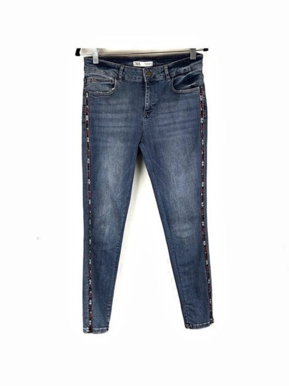 Zara denim jeans in a medium wash with beaded and ribbon detail down the sides i